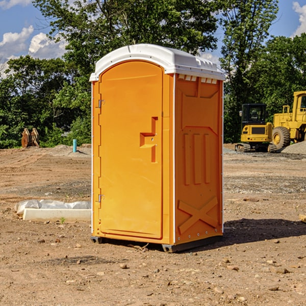 how often are the portable restrooms cleaned and serviced during a rental period in Adams WI